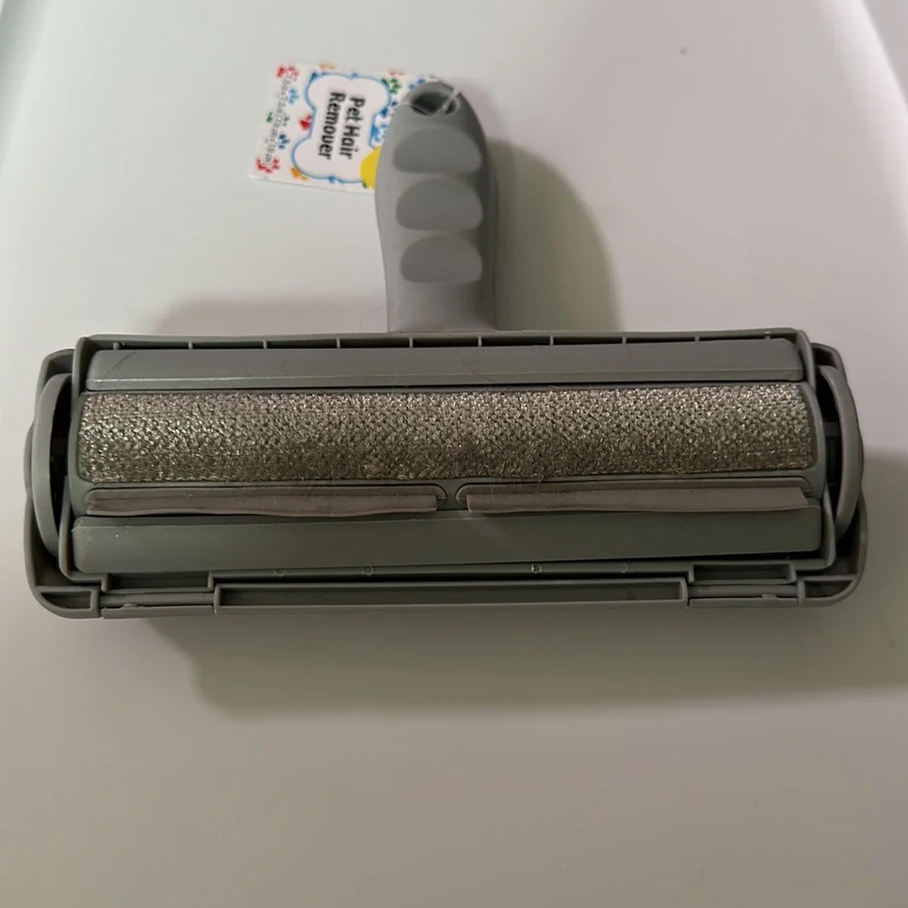 COPY - NWT pet hair remover roll the brush along any surface with pet hair and …